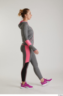  Mia Brown  1 dressed grey hoodie grey leggings pink sneakers side view sports walking whole body 0004.jpg